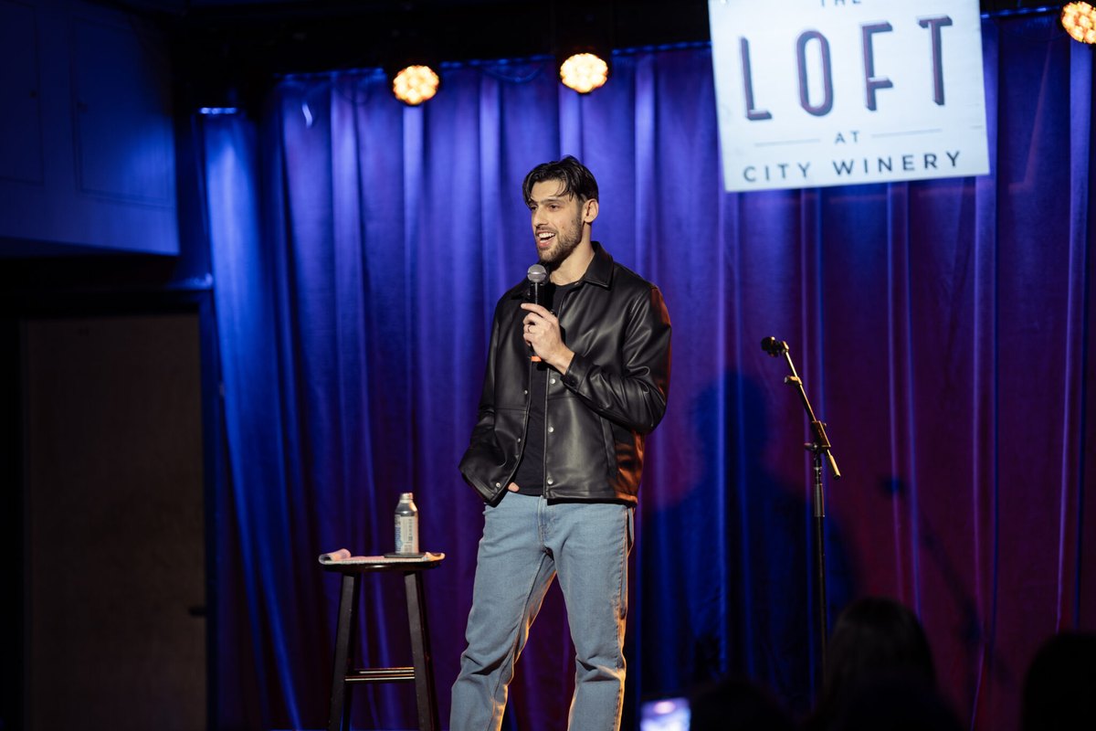 Mikey Greenblatt performing stand-up comedy at The Loft at City Winery