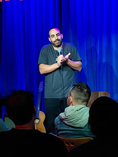 Ben Ben Baruch performing on stage